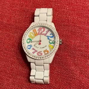 Betsey Johnson white watch with multi-colored numbers